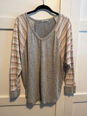 Cozy Gray Raglan Sweater with Multicolor Stripe Sleeves